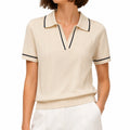 Pull polo femme L en maille crème à liserés noirs manches courtes
